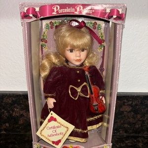 VINTAGE PETITE PORCELAIN DOLL